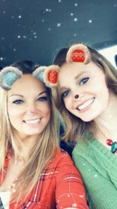 girls using snapchat holiday filter 