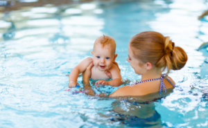 baby swim class with parent