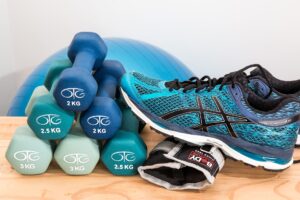 dumbbells and running shoes
