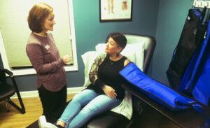 Ashley with lymphedema patient Ashley with lymphedema patient